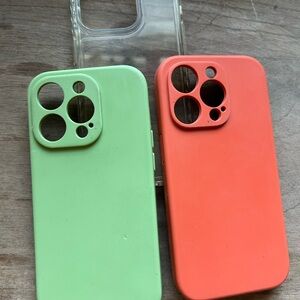 iPhone 14 Pro cases in Green, Clear, and Salmon Color